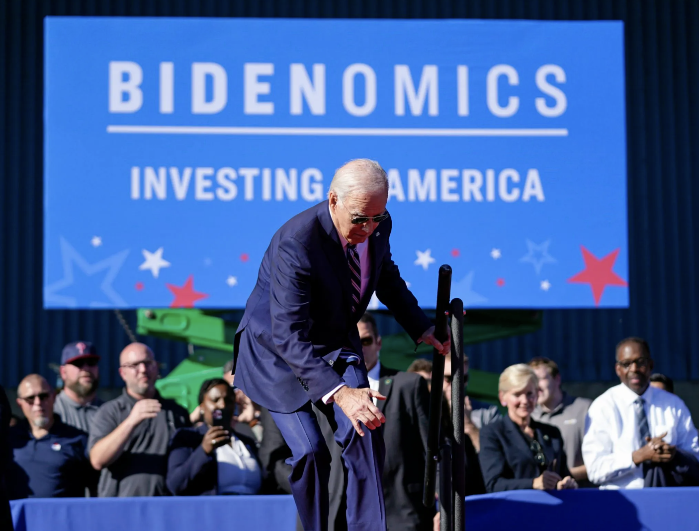 Biden tripped twice while walking up a small set of stairs to speak on a stage at the Tioga Marine Terminal in Philadelphia
